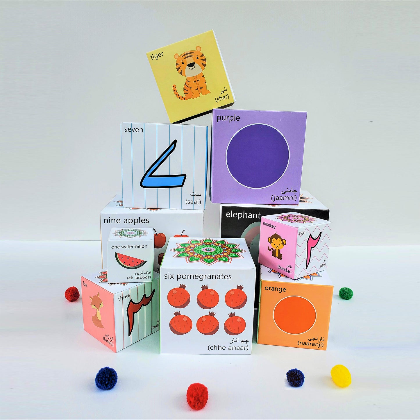 Urdu blocks learn colours, numbers, animals, fruits and counting. Stack them up or nest them. Play based educational toys.