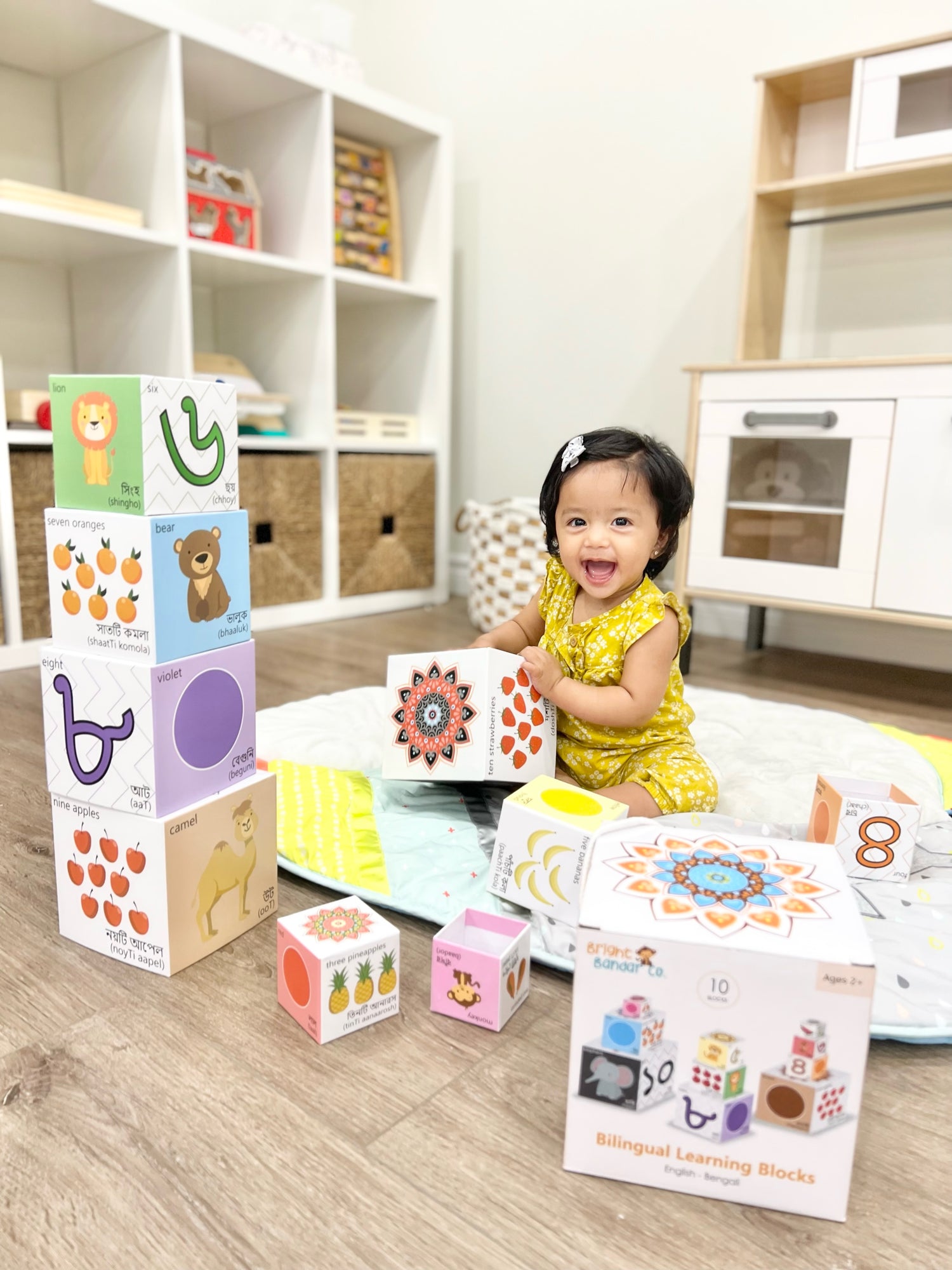 child-playing-with-bangla-english-stackable-nesting-blocks