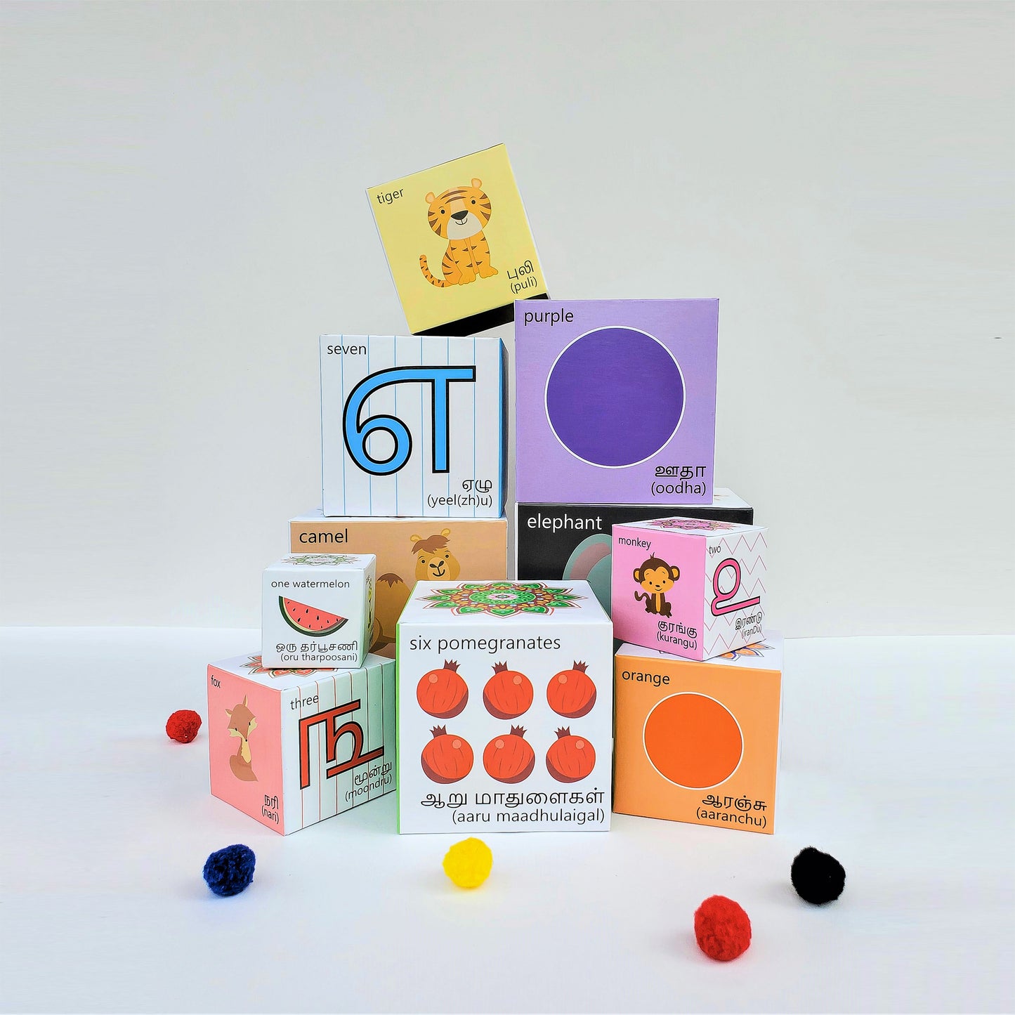 Tamil blocks learn colours, numbers, animals, fruits and counting. Stack them up or nest them. Play based educational toys.