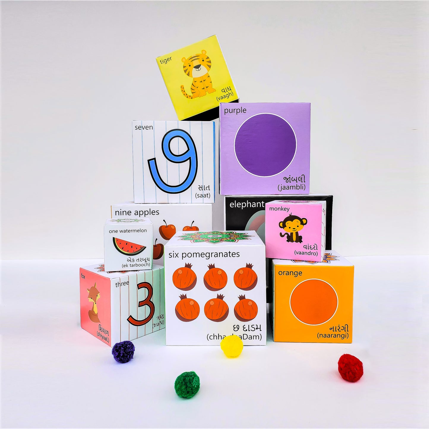 Gujarati blocks learn colours, numbers, animals, fruits and counting. Stack them up or nest them. Play based educational toys.