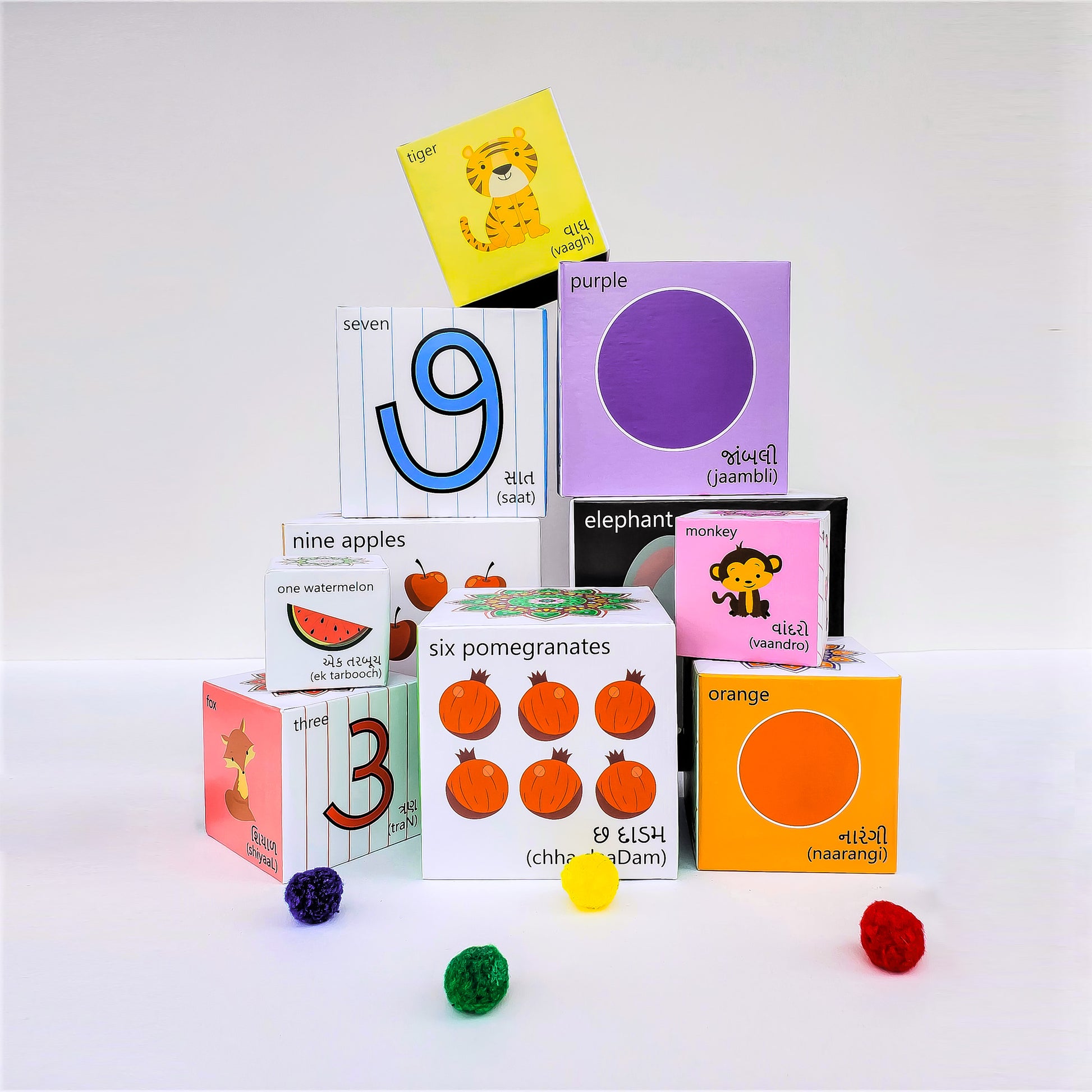 Gujarati blocks learn colours, numbers, animals, fruits and counting. Stack them up or nest them. Play based educational toys.